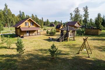 Фото номера Коттедж люкс с 4 спальнями  База отдыха Озерный Берег г. Приозерск 5